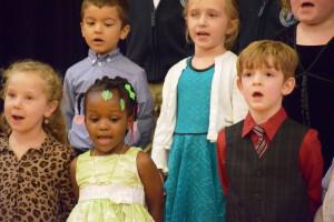 Early Childhood and Kindergarten Sing for their grandparents and special friends.